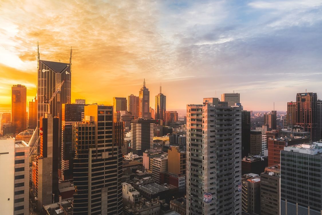 City skyline at sunset, representing work authorisation bases for employers hiring in Serbia