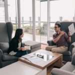 HR team reviewing employee relocation policies